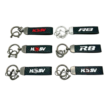 key ring with HSV and R8 branding on a carbon background