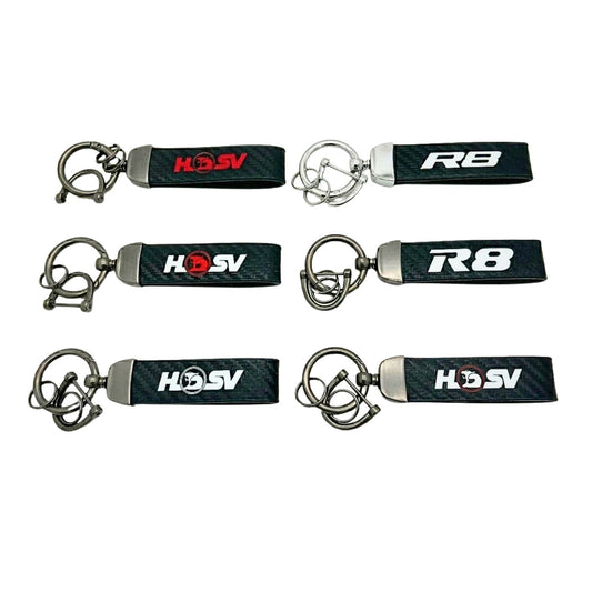 key ring with HSV and R8 branding on a carbon background